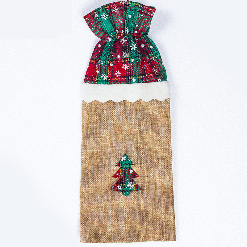 Set of four Christmas wine bottle bag designs including tree and star patterns