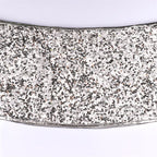 Close-up of shimmering silver sequin detail on bead cloth Christmas tree skirt fabric