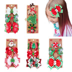 Close-up of festive ribbon bow barrettes arranged for holiday display