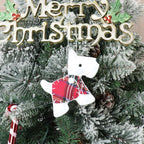 Dressed checkered dog ornament in brown with Christmas tree pendant