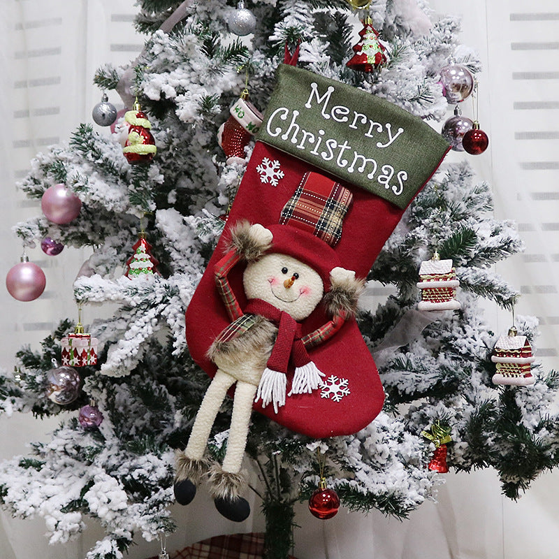 Holiday decorating scene showing Christmas stockings as part of festive seasonal home decor tradition