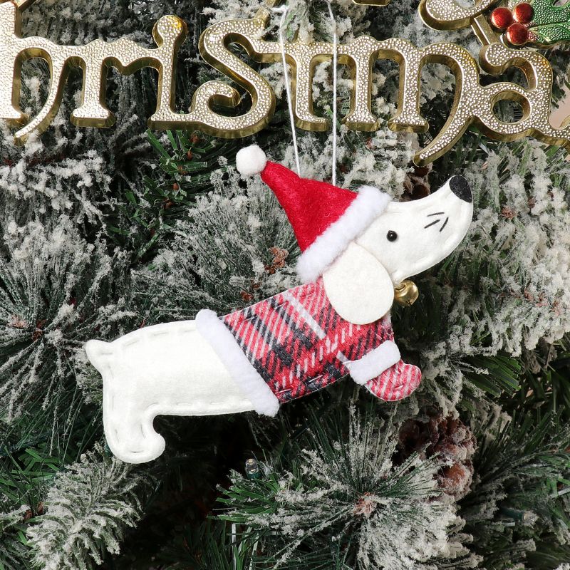 Festive sausage dog ornament in brown celebrating loyal companionship during the holidays