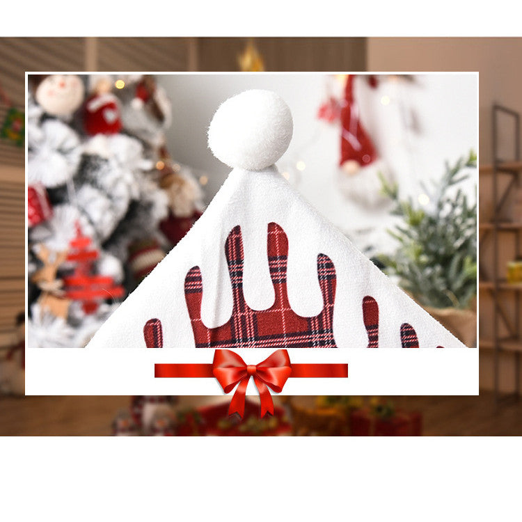 Festive green chair cover with alphabet lettering for Christmas dining ambiance