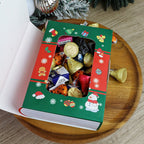 Festive storybook candy boxes displayed at party setting