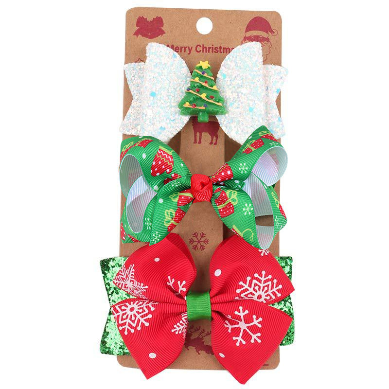 Assorted Christmas bow barrettes showing different ribbon color options