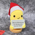 Yellow plush Christmas decoration placed on decorative base in festive setting