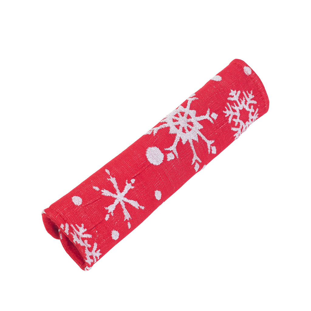Seasonal Christmas kitchen decoration featuring handle covers in traditional holiday colors
