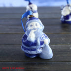 Handcrafted-style porcelain Christmas ornament with blue and white finish