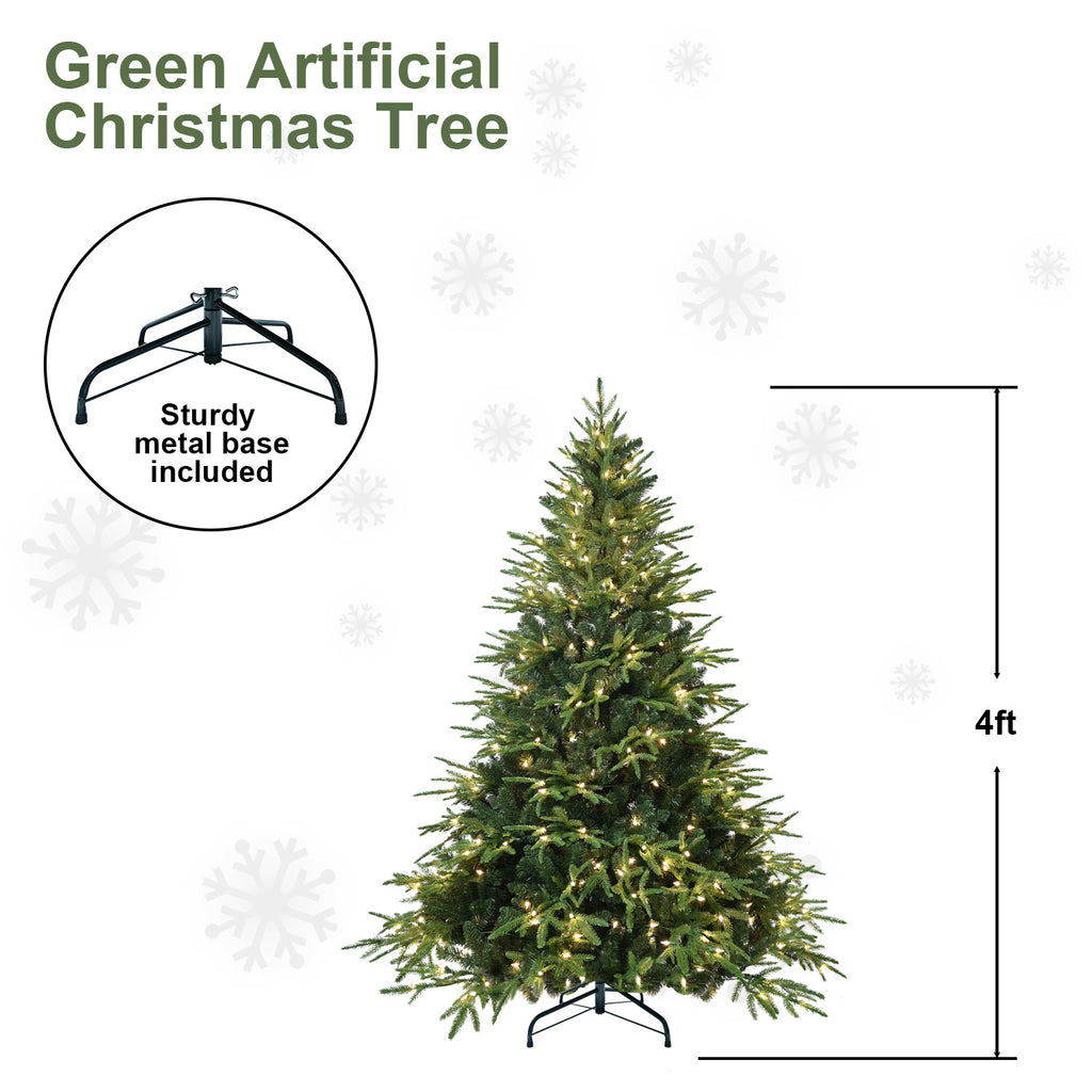 Green PVC Christmas tree with warm pre-lit glow in living room setting