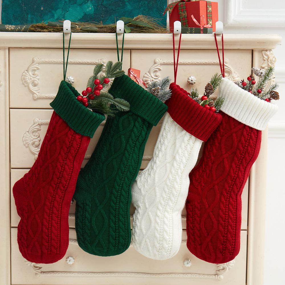 White Christmas stocking with red green edge detail for versatile holiday decor