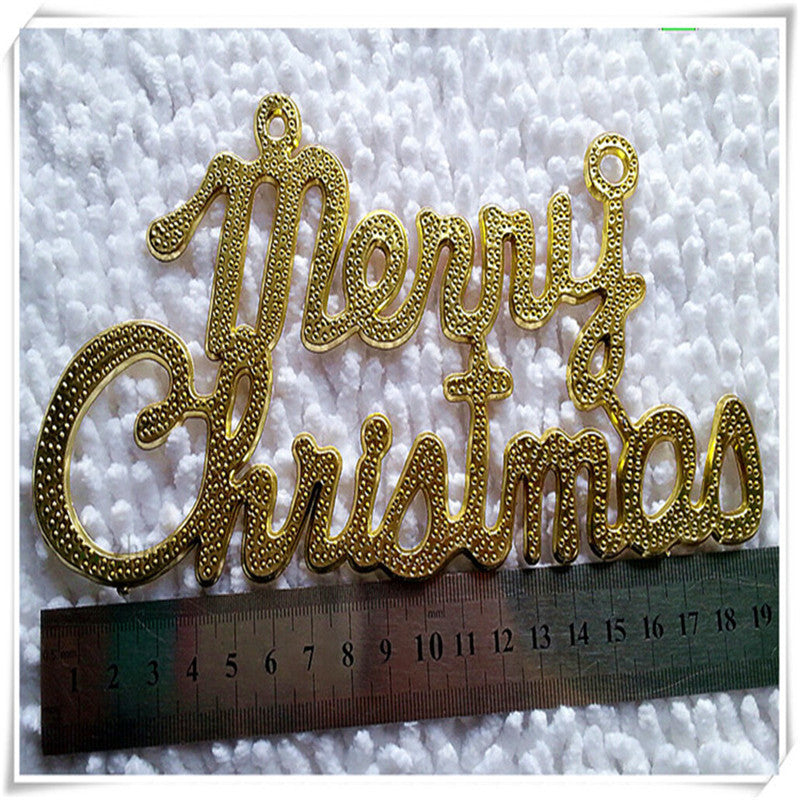 Set of gold Christmas letter pendants in multiple sizes for tree decoration
