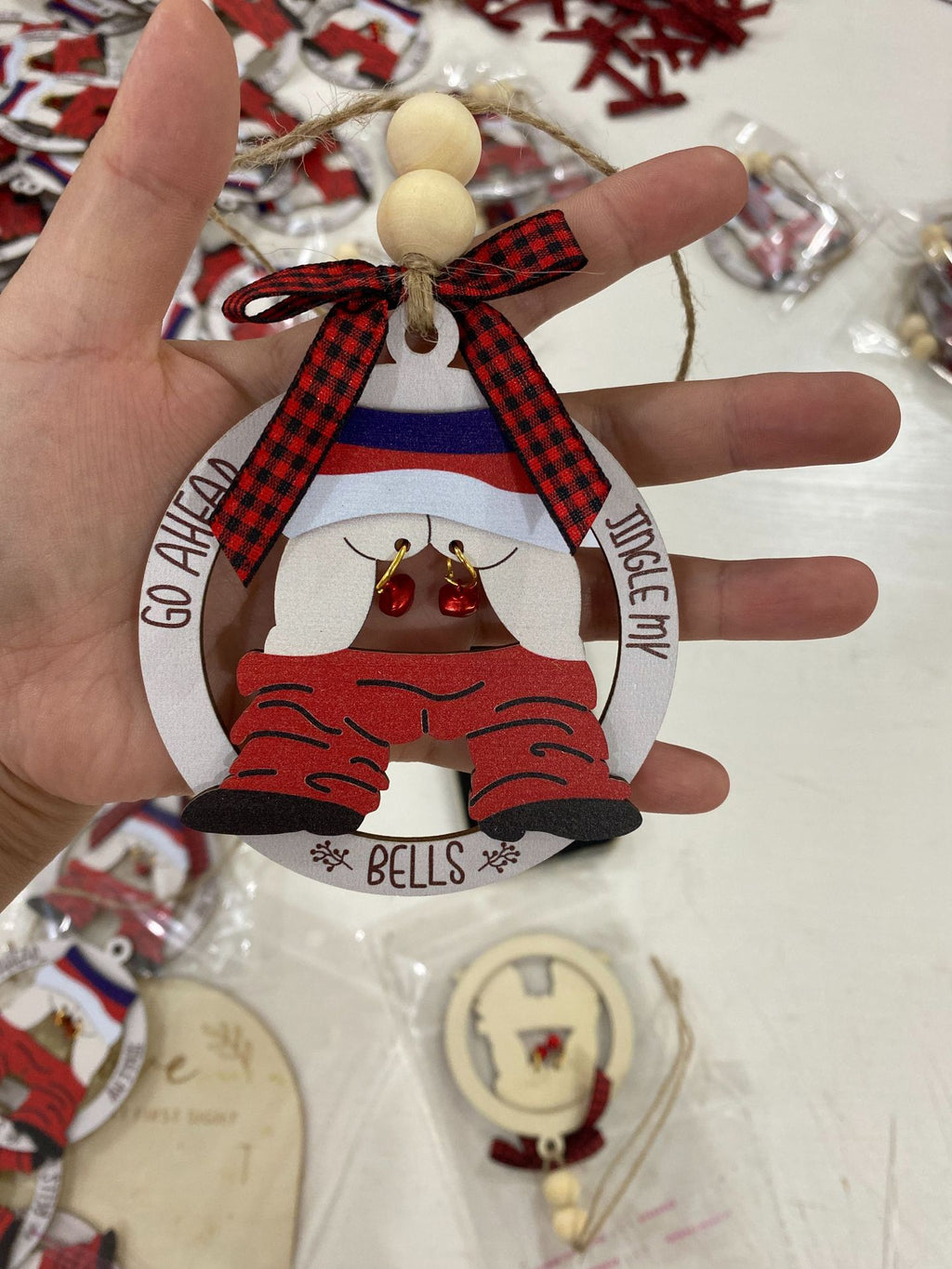 Wooden boxwood pendant capturing Christmas joy and faith symbolism