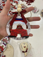 Wooden boxwood pendant capturing Christmas joy and faith symbolism