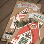 Wooden house ornament with festive bow for Christmas doorway display