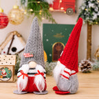 Minimalist faceless doll ornament with Christmas pointed hat design