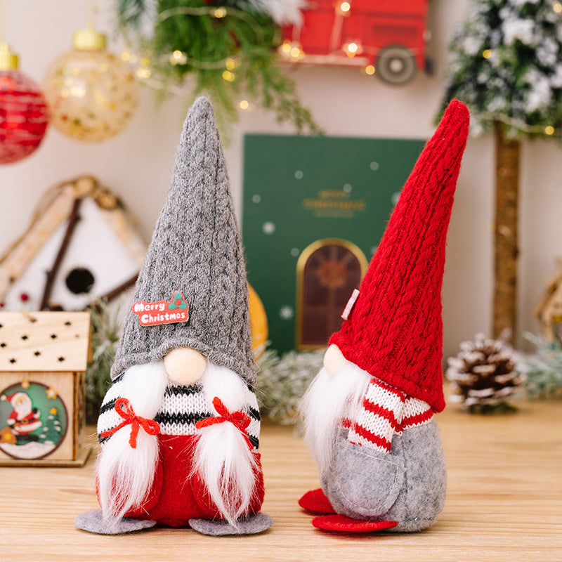Minimalist faceless doll ornament with Christmas pointed hat design