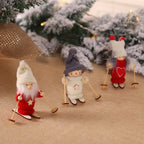Set of wooden ski doll Christmas decorations arranged for display
