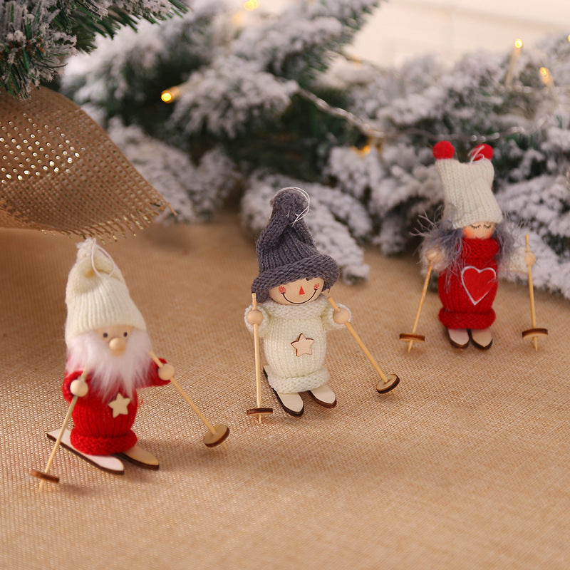 Set of wooden ski doll Christmas decorations arranged for display