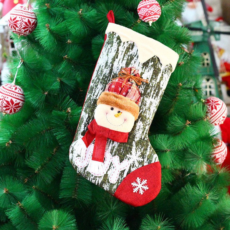 Festive Christmas doll gift bag close-up view