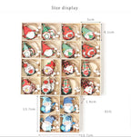 12 wooden Christmas pendant decorations arranged in wooden box