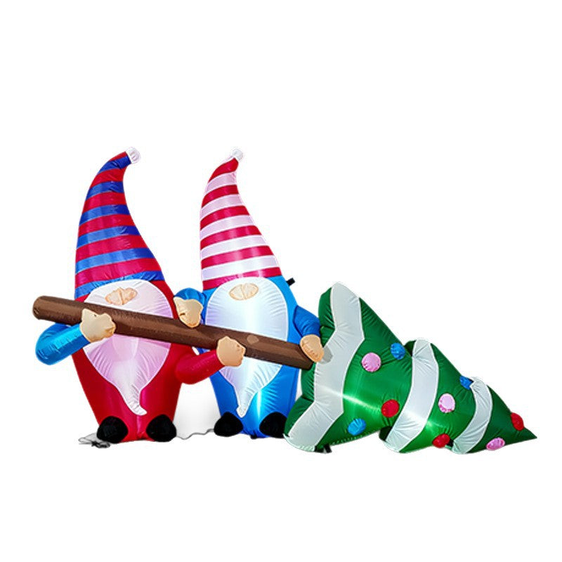 Christmas inflatable decoration standing in snowy yard for holiday display