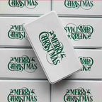 Green Christmas cookie box with gold pattern details and holly decoration