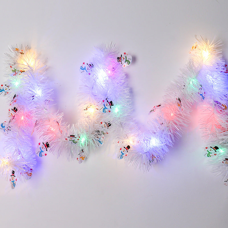 Christmas ribbon strip lights with Santa Claus design glowing warmly Main image