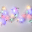 Christmas ribbon strip lights with Santa Claus design glowing warmly