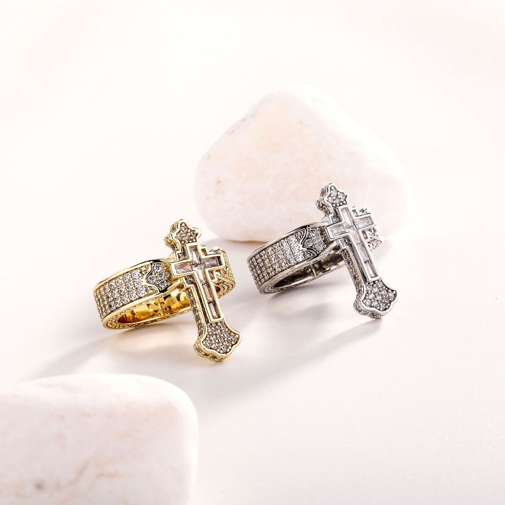 Gold-toned cross signet ring on white background - Christian Jewelry
