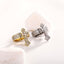 Gold-toned cross signet ring on white background - Christian Jewelry