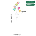 Pastel foam Christmas twigs with wrought iron wire stems in soft holiday color palette