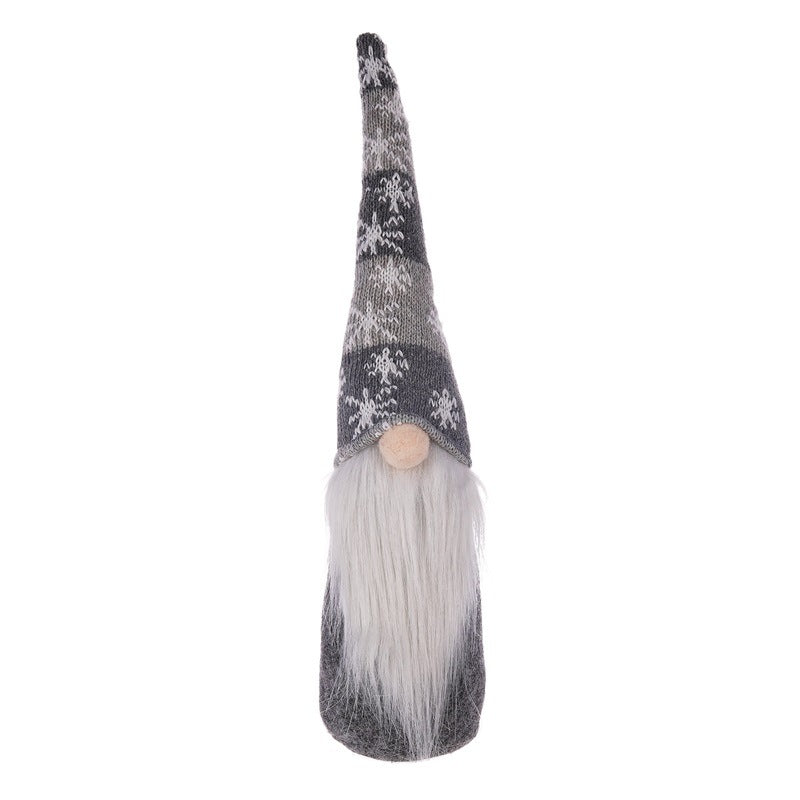 Long body doll pendant showing ornate cloth texture detail