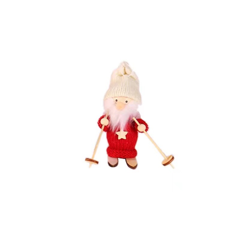 Wooden ski doll ornament in red skirt with matching hat for Christmas tree