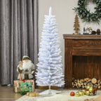 5-foot white pencil Christmas tree with snow flocked branches in a cozy living room setting