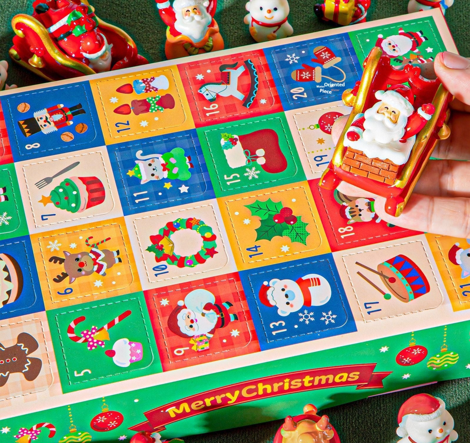 Christmas peek-a-boo figurine with holiday greenery background