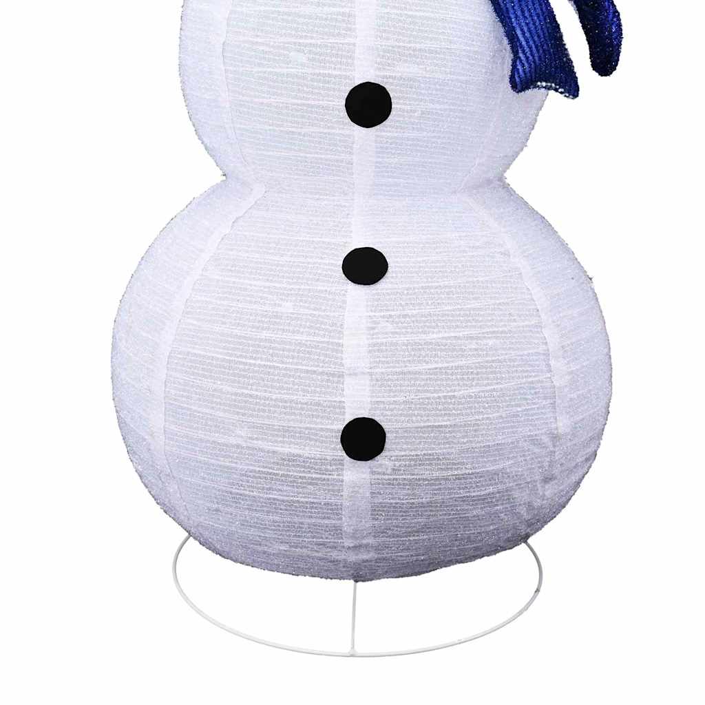 Three fabric snowman figures glowing warmly