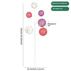 Macaron color Christmas twig arrangement with soft pastel foam blooms on wrought iron stems, festive home decor
