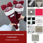 Christmas cone fruit bouquet decoration with festive bow