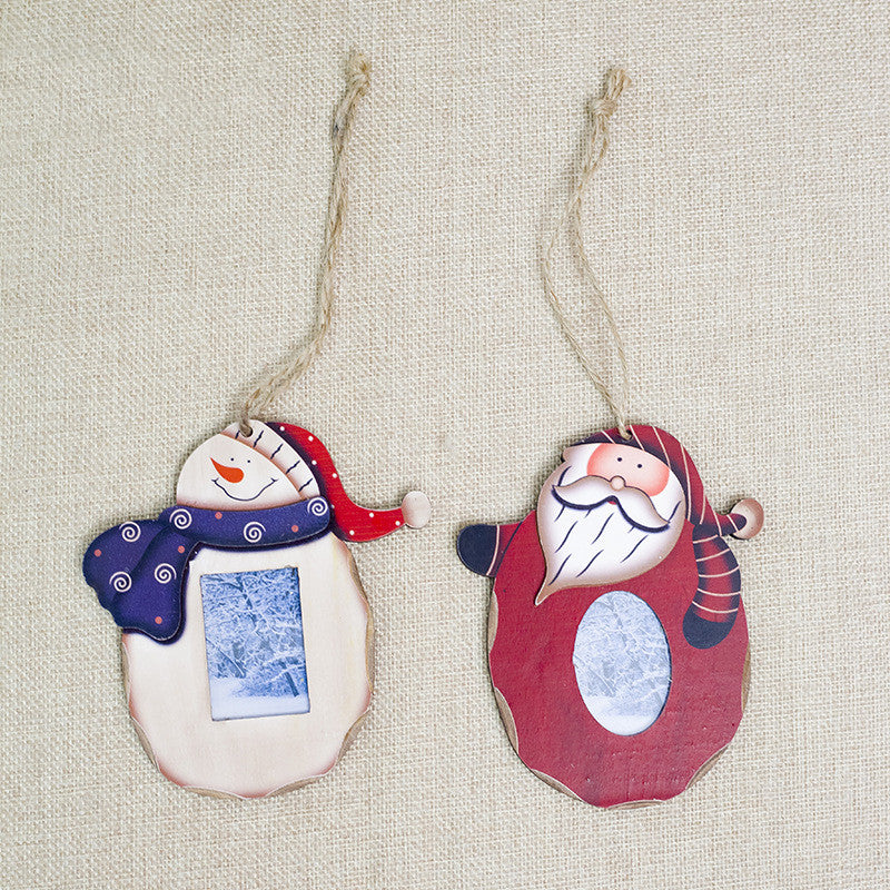 Wooden photo frame pendant displayed as Christmas wall decoration