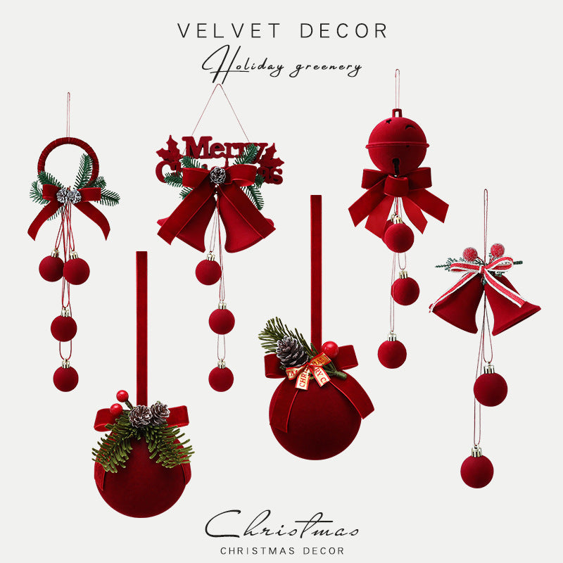Cozy Christmas decorations featuring flocked bell ornaments in wine red