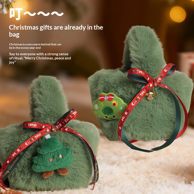Green plush candy bag with holiday theme for Christmas celebrations