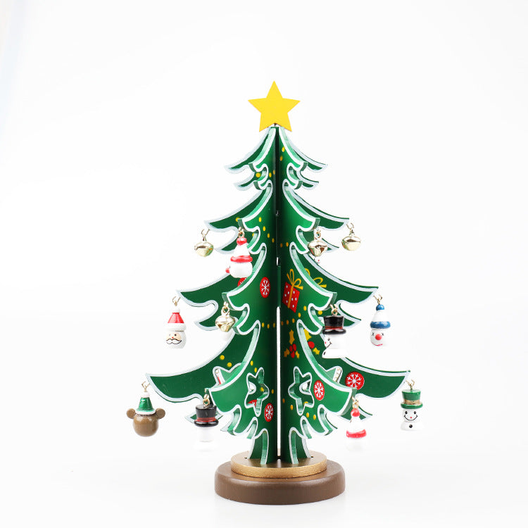 Festive wooden Christmas tree ornament set with red and green accents on natural wood background