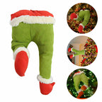 Close-up of green cloth prosthetic leg Christmas decoration detail