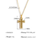 Close-up view of elegant gold cross pendant on delicate chain