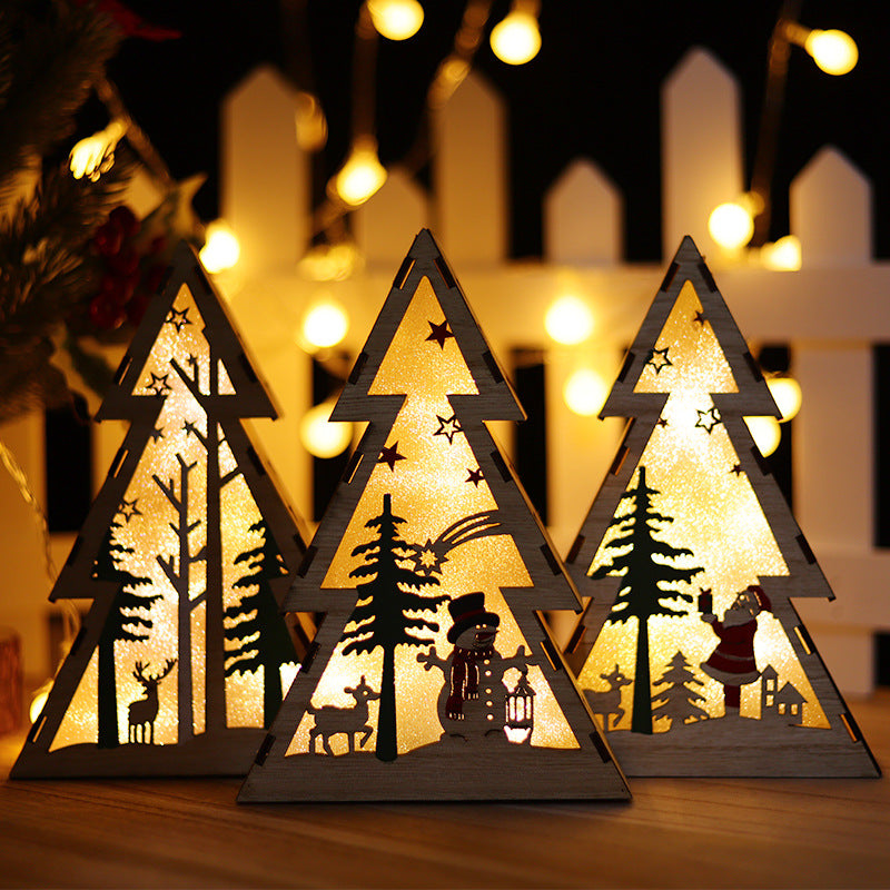 Wooden triangle Christmas ornament with glowing lights featuring snowman design for holiday decorating
