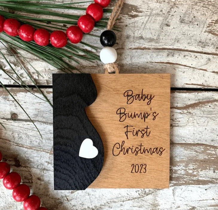 Wooden Christmas tree pendant with warm natural finish for expecting parents Main image