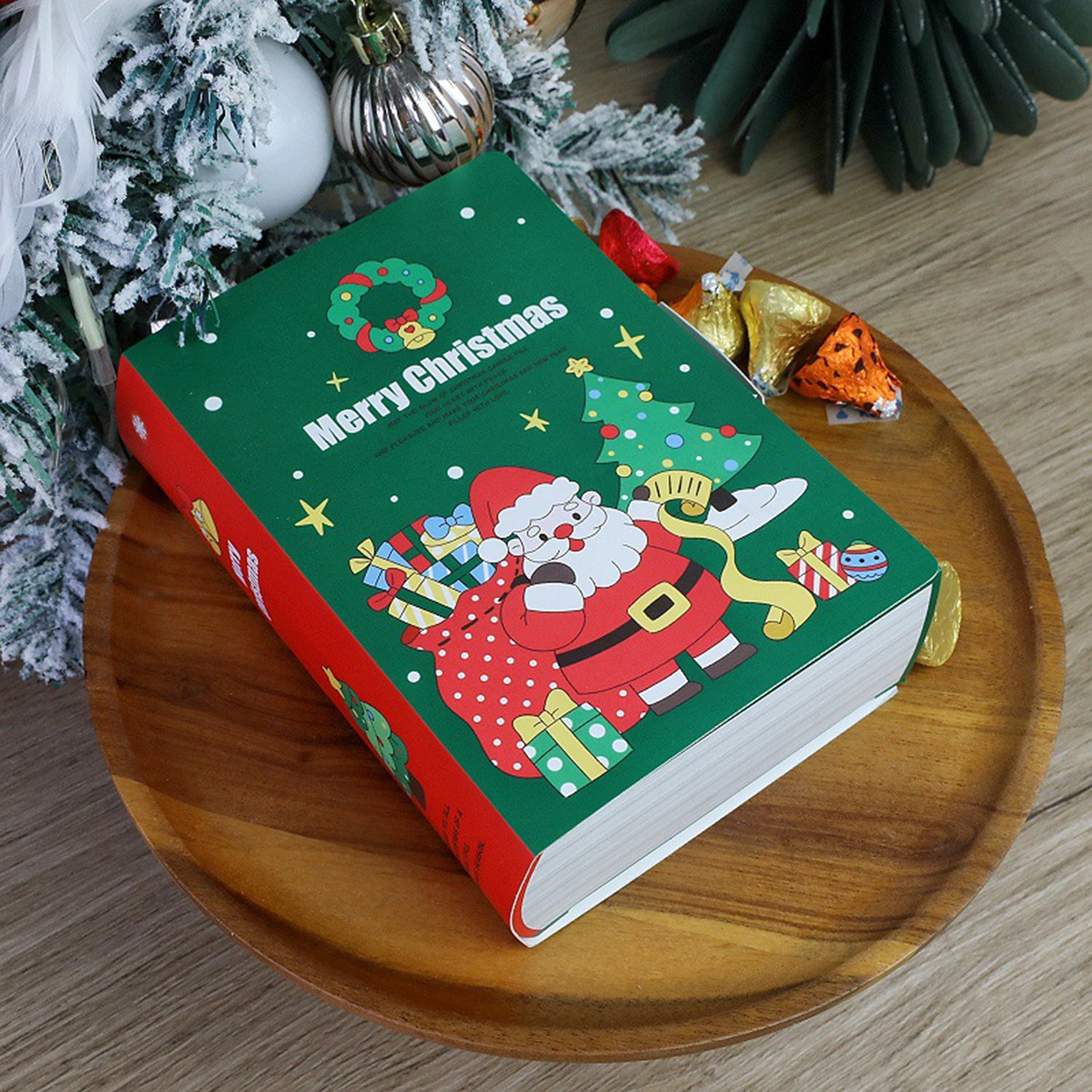 Green Christmas storybook shaped candy box filled with treats Main image