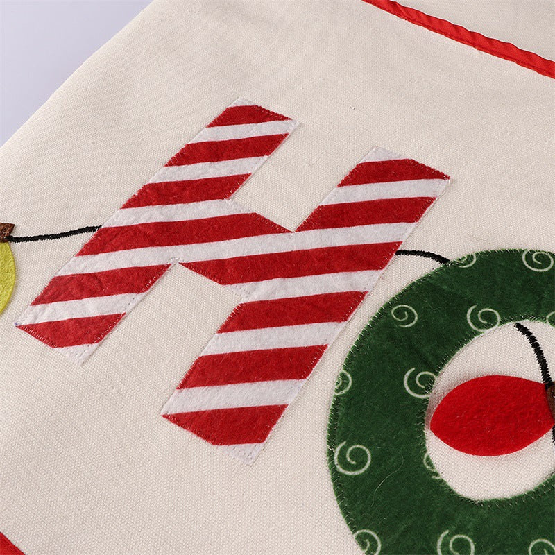 Festive creative letters design on circular Christmas tree skirt decoration