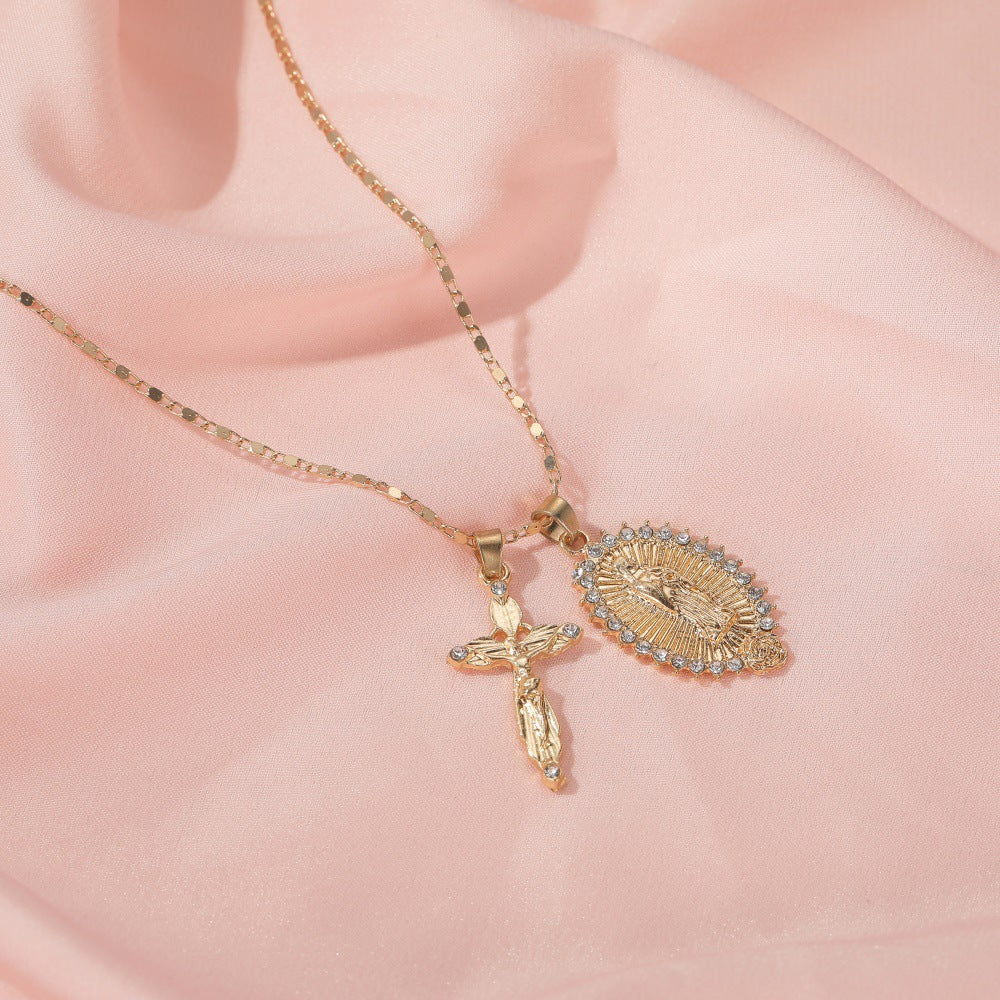 Gold-tone crucifix and Virgin Mary cross necklace on chain