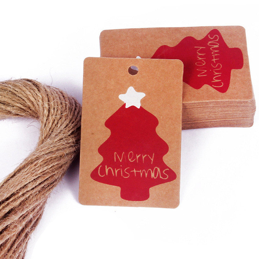 Close-up of vintage kraft paper Christmas tag designs including snowflakes